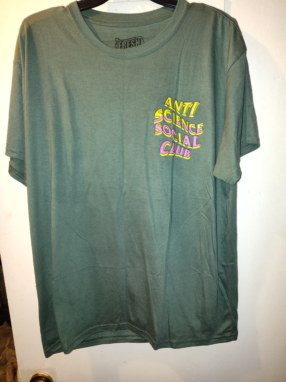 Anti Science Social Club Green Short Sleeve Graphic Tee with Yellow & Pink Print